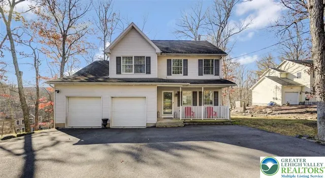 a view of a street with houses