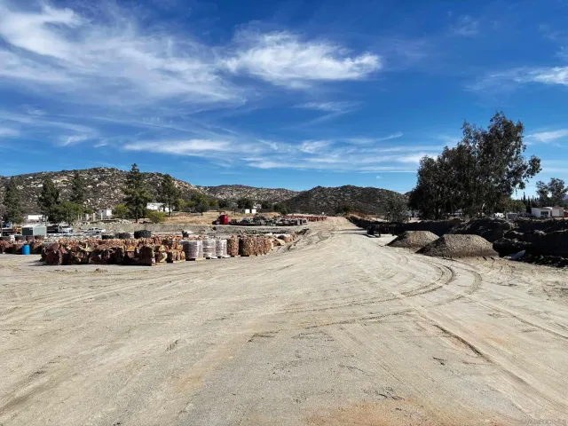 a view of car parked on the side of a road