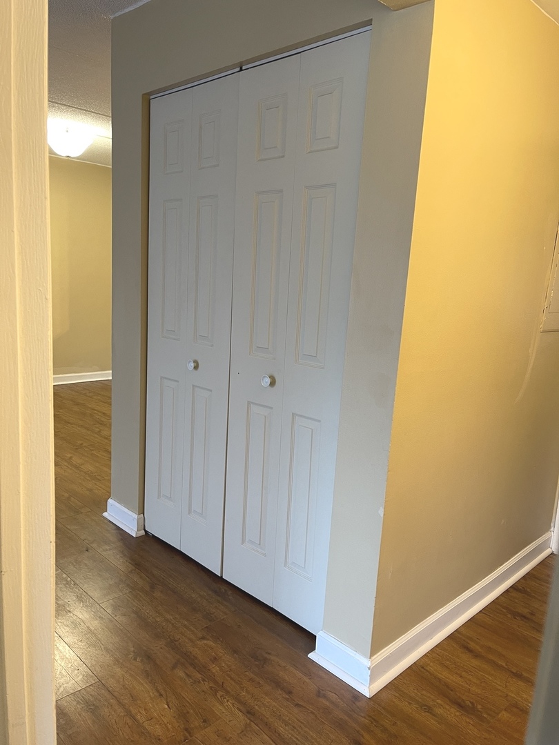 964 North Rohlwing Road, Unit GB Addison, IL 60101 - Photo 21 of 27 a view of empty room with wooden floor