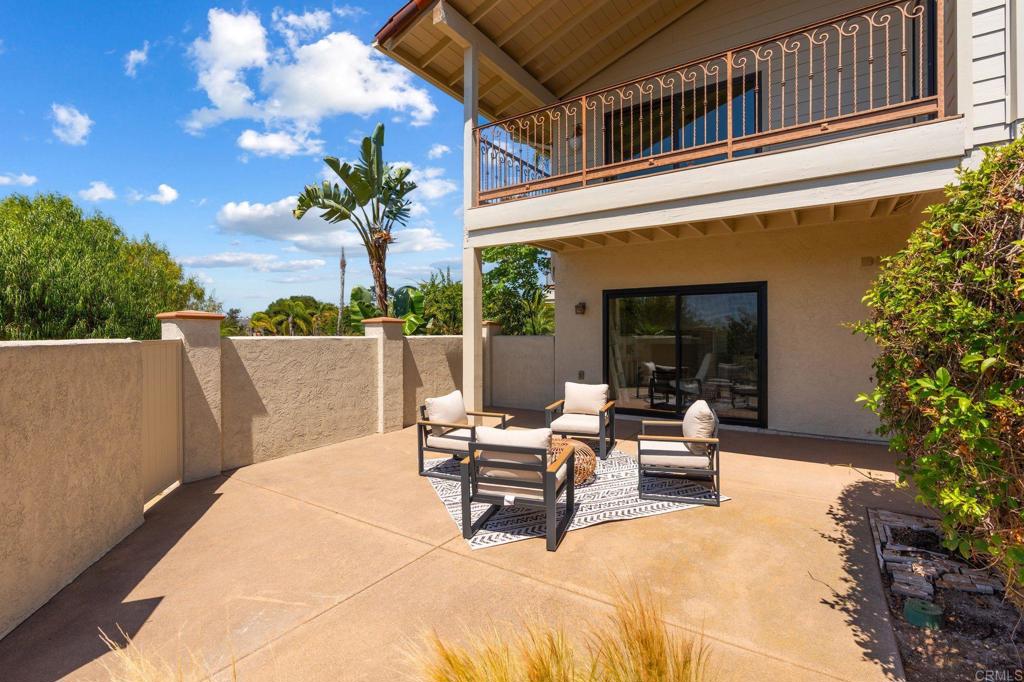 13319 Pacer Lane Poway, CA 92064 - Photo 38 of 75 a view of a patio with table and chairs and potted plants