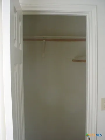 a stove top oven sitting inside of a kitchen