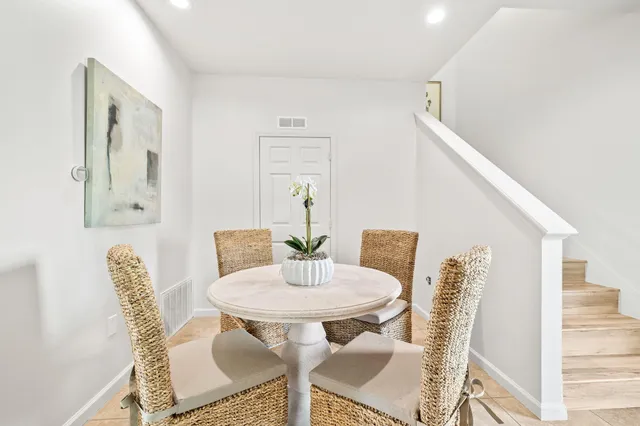 a view of a dining room with furniture