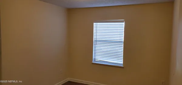 a view of a small space with a window