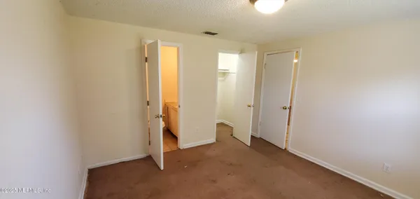 an empty room with closet