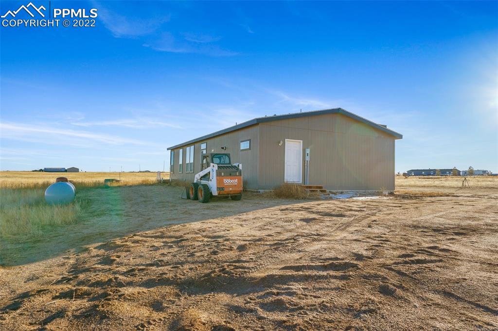 11255 Berridge Road Calhan, CO 80808 - Photo 23 of 30 a big house with a big yard