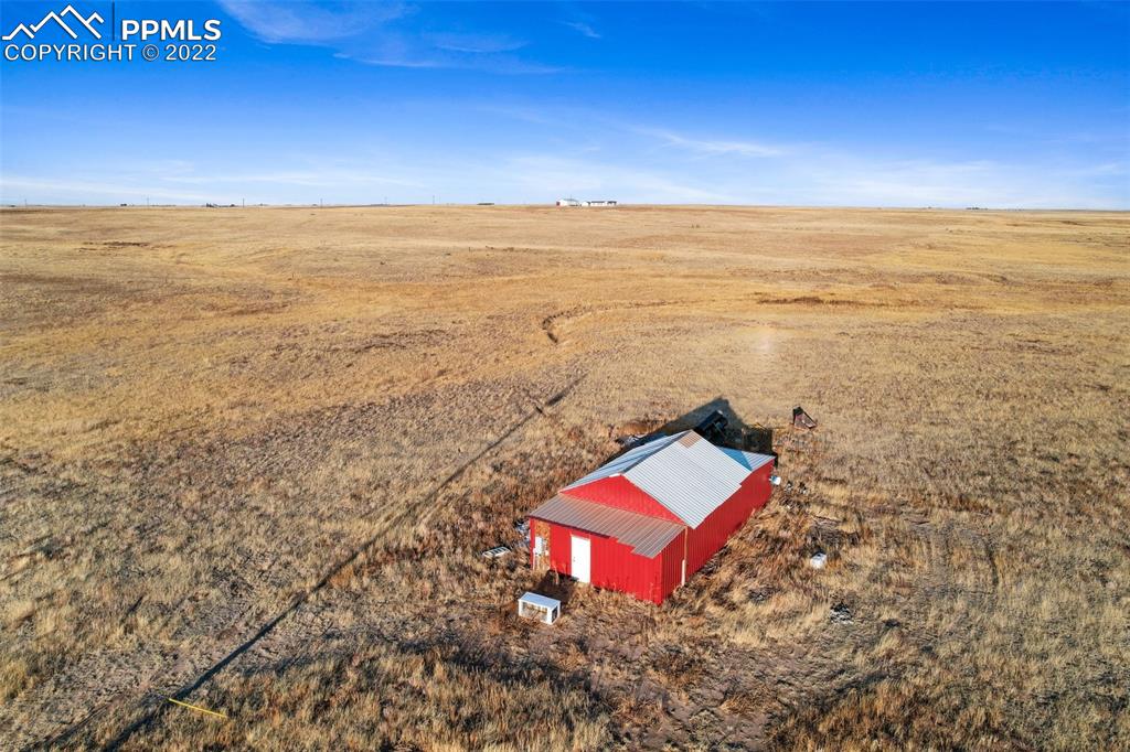 11255 Berridge Road Calhan, CO 80808 - Photo 27 of 30 a view of an ocean and beach
