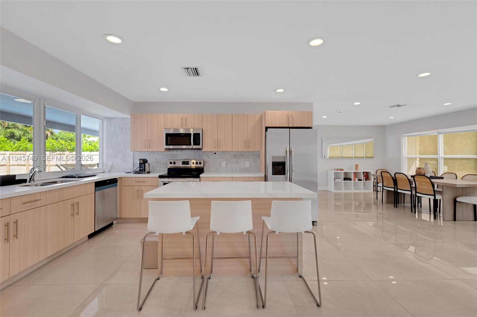 3500 North Park Road Hollywood, FL 33021 - Photo 1 of 39 a kitchen with appliances a sink a counter top space and cabinets