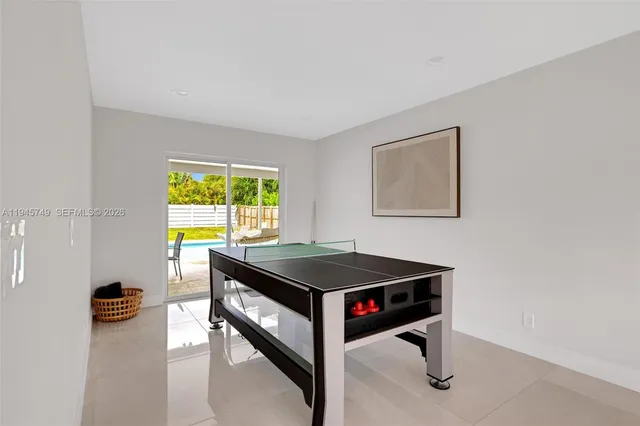 a room with a table and a window