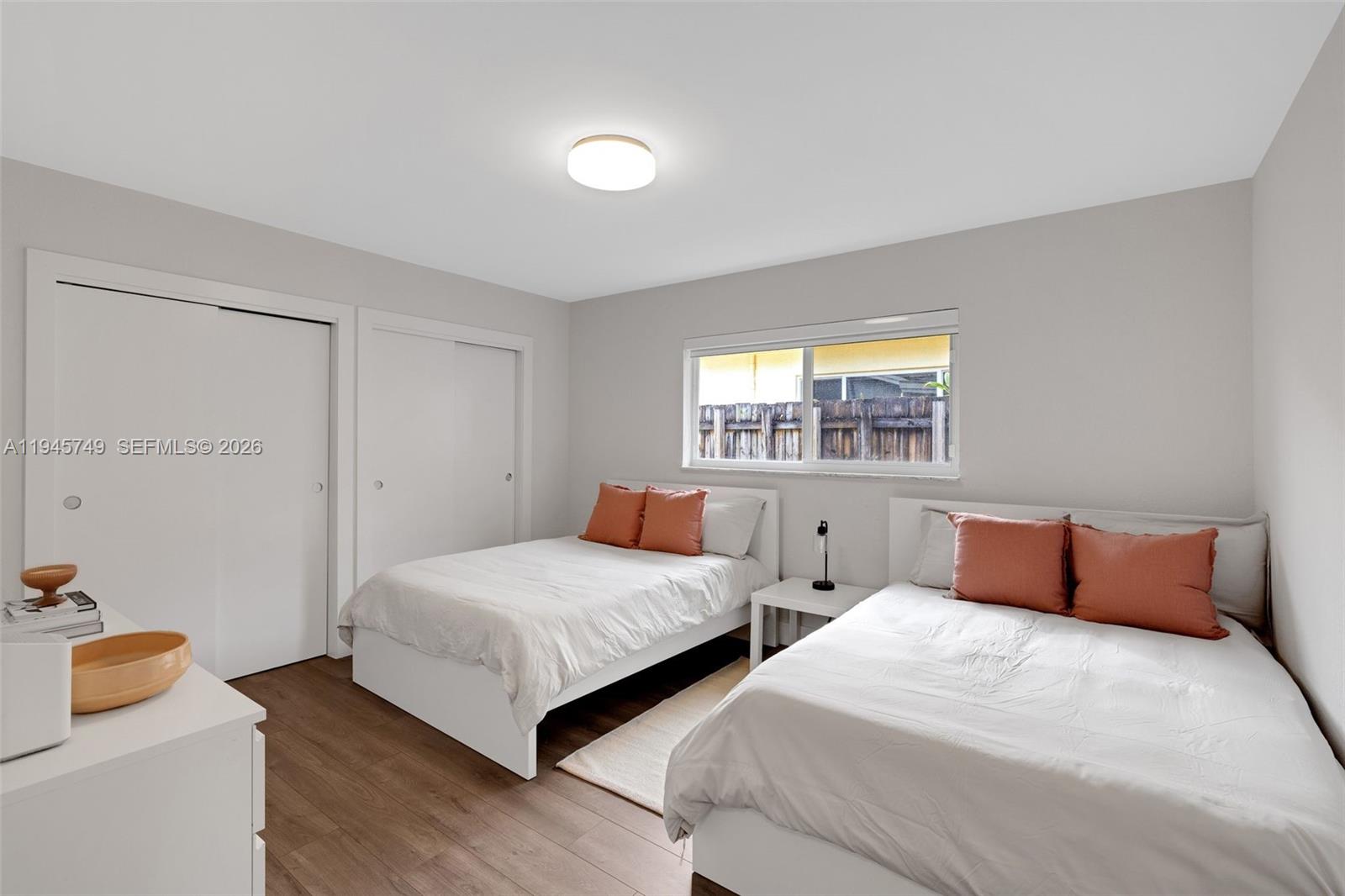 3500 North Park Road Hollywood, FL 33021 - Photo 23 of 39 a bedroom with two beds and a window