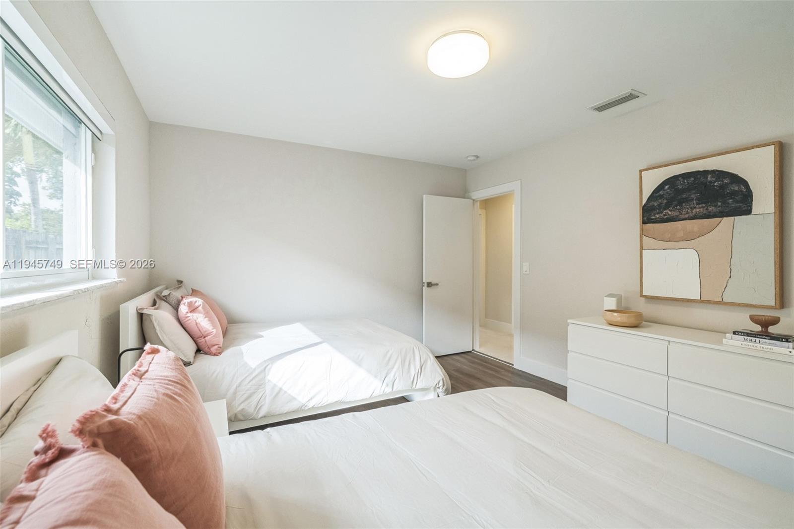 3500 North Park Road Hollywood, FL 33021 - Photo 24 of 39 a bedroom with a bed and a window