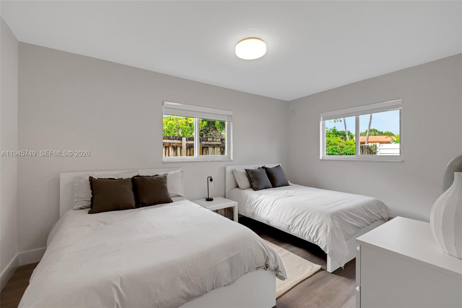 3500 North Park Road Hollywood, FL 33021 - Photo 25 of 39 a bedroom with two beds and a window