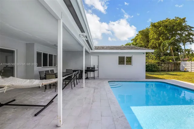 a view of kitchen with furniture and a tub