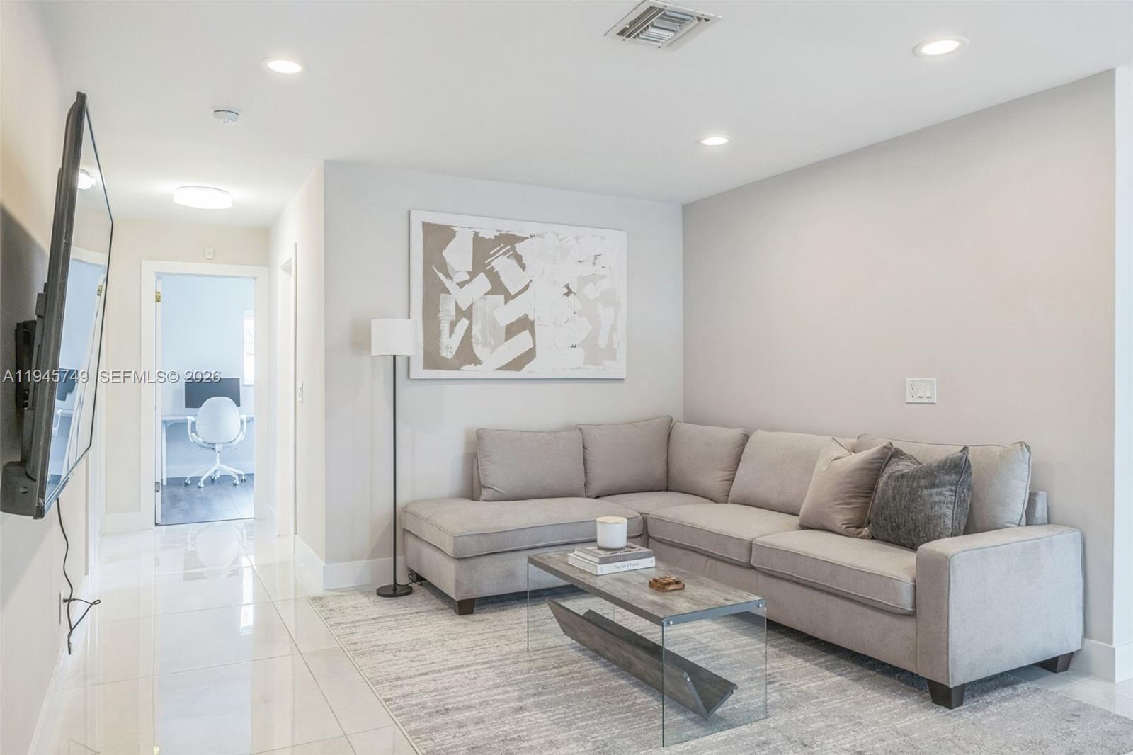 3500 North Park Road Hollywood, FL 33021 - Photo 5 of 39 a living room with furniture and white walls
