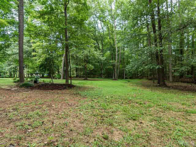 2833 Brenfield Drive Raleigh, NC 27606 - Photo 22 of 24 Back Yard