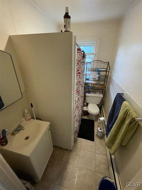 707 South 5th Street, Unit 2 Allentown, PA 18103 - Photo 4 of 9 a bathroom with a sink and a shower