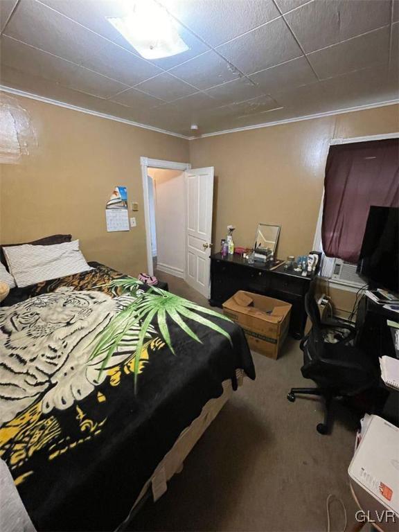 707 South 5th Street, Unit 2 Allentown, PA 18103 - Photo 7 of 9 a bedroom with a bed and a desk