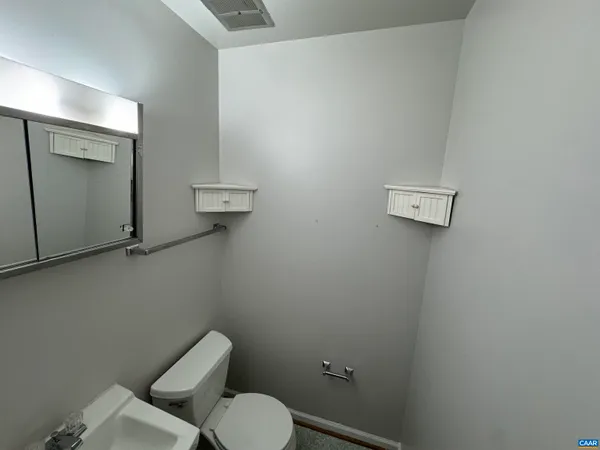 a bathroom with a toilet