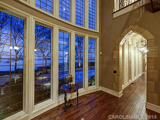 16505 Jetton Road Cornelius, NC 28031 - Photo 17 of 23 a view of front door with dining room and stairs