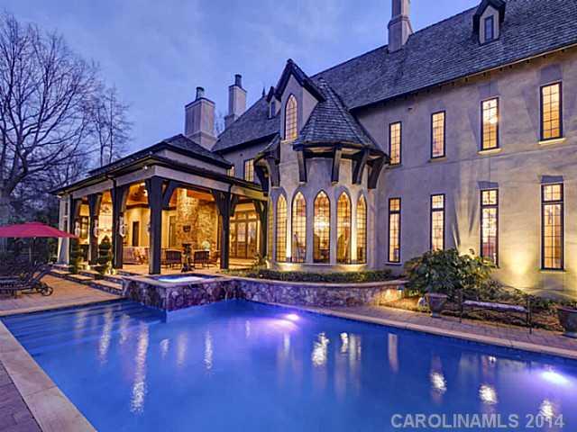 16505 Jetton Road Cornelius, NC 28031 - Photo 3 of 23 a view of a house with swimming pool patio and furniture