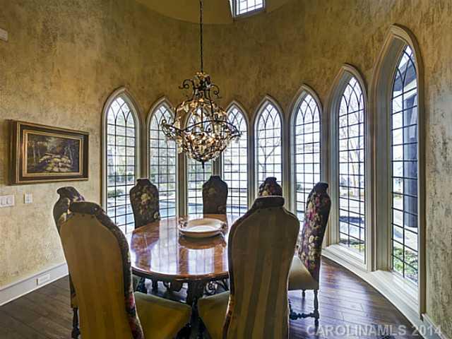 16505 Jetton Road Cornelius, NC 28031 - Photo 8 of 23 a view of a dining room with furniture window and wooden floor