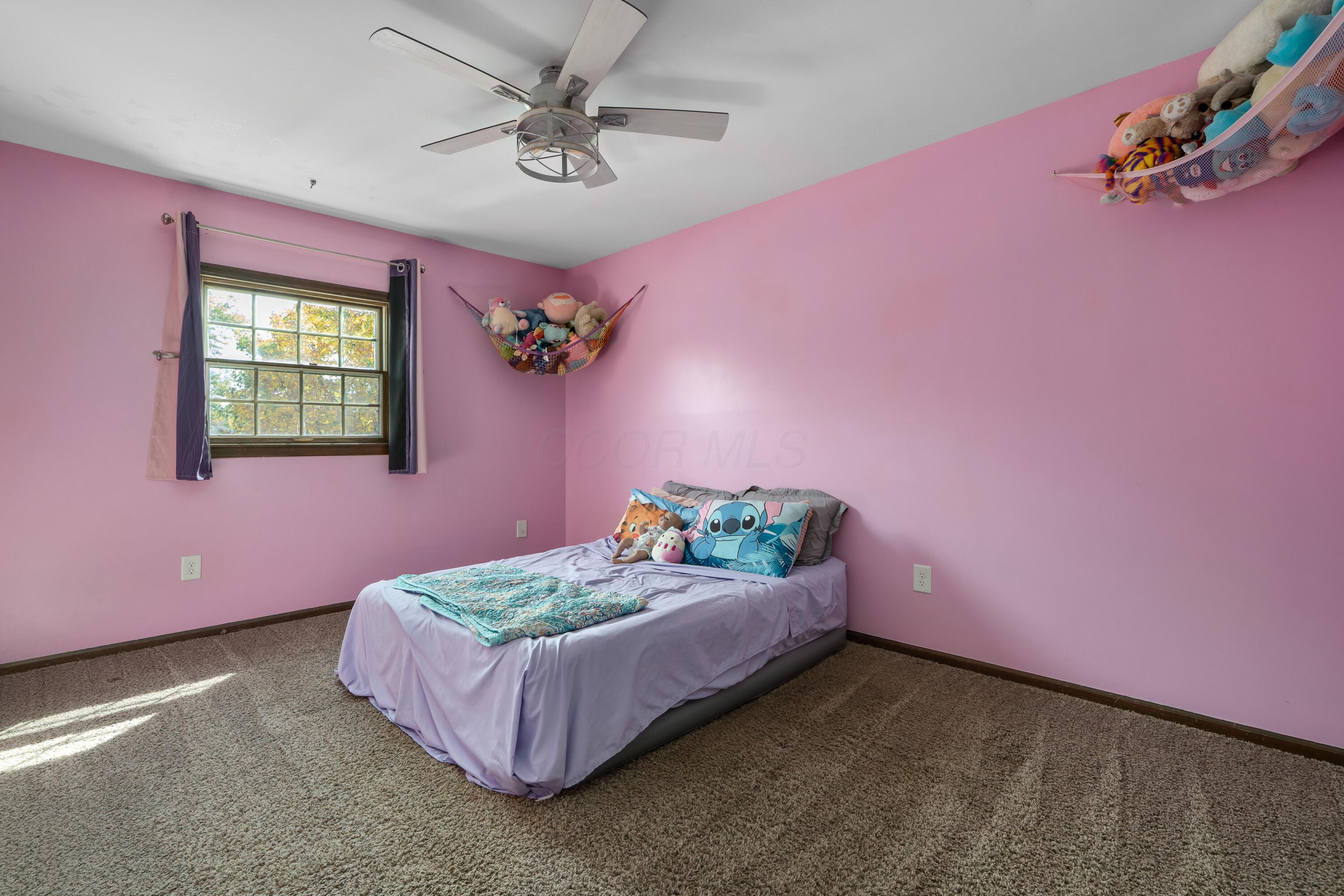 5879 Ravine View Court Columbus, OH 43231 - Photo 24 of 43 Bedroom 3 with ceiling fan/light