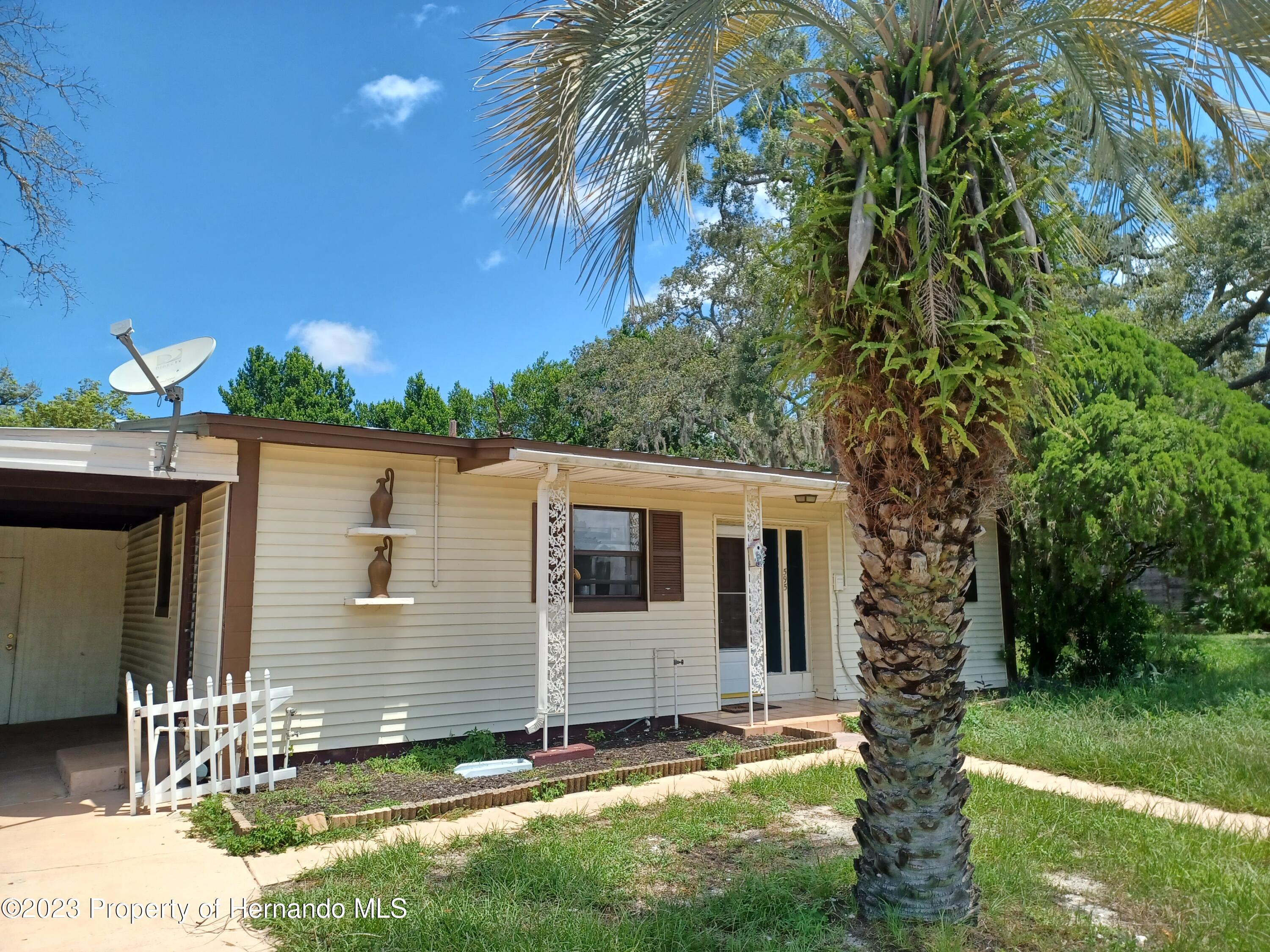 595 Swallow Lane Spring Hill, FL 34606 - Photo 2 of 24 20230721_124348