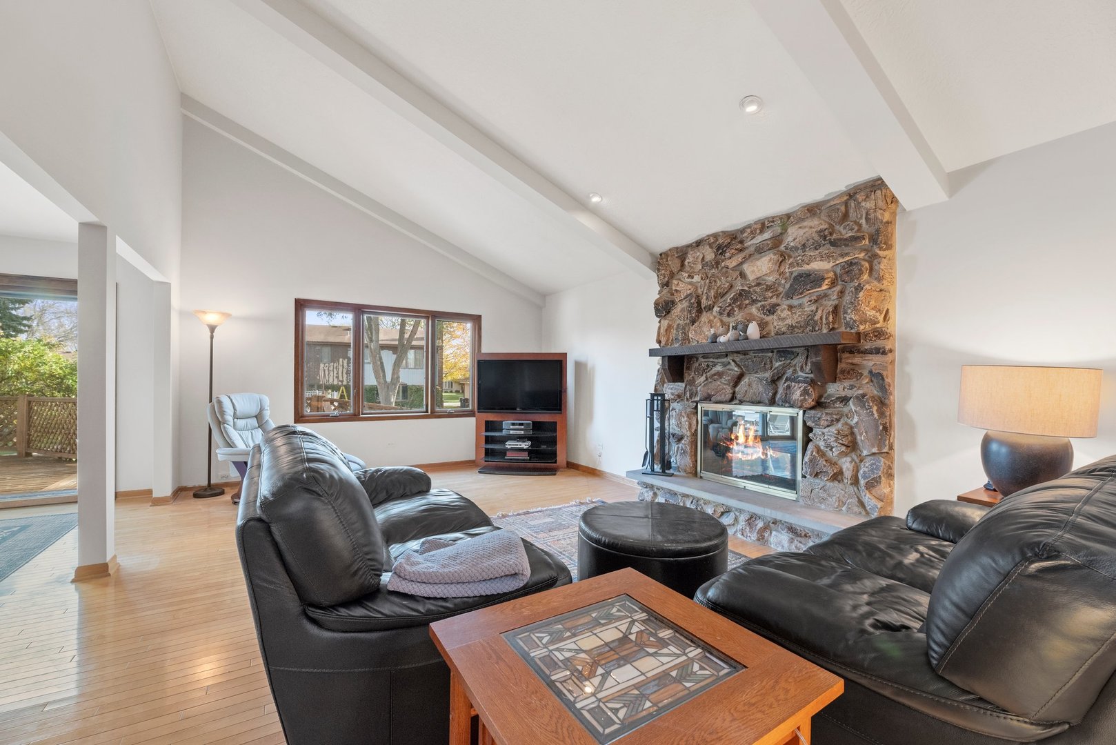 1133 Old Fence Road Addison, IL 60101 - Photo 12 of 29 a living room with furniture and a fireplace