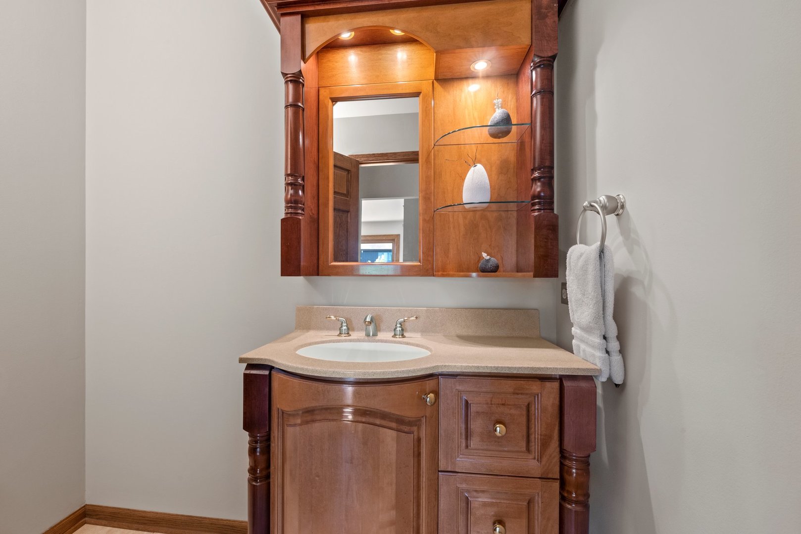 1133 Old Fence Road Addison, IL 60101 - Photo 13 of 29 a bathroom with a sink and a mirror