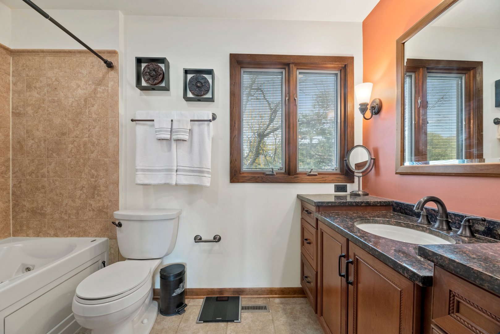 1133 Old Fence Road Addison, IL 60101 - Photo 16 of 29 a bathroom with a granite countertop toilet a sink and a bathtub