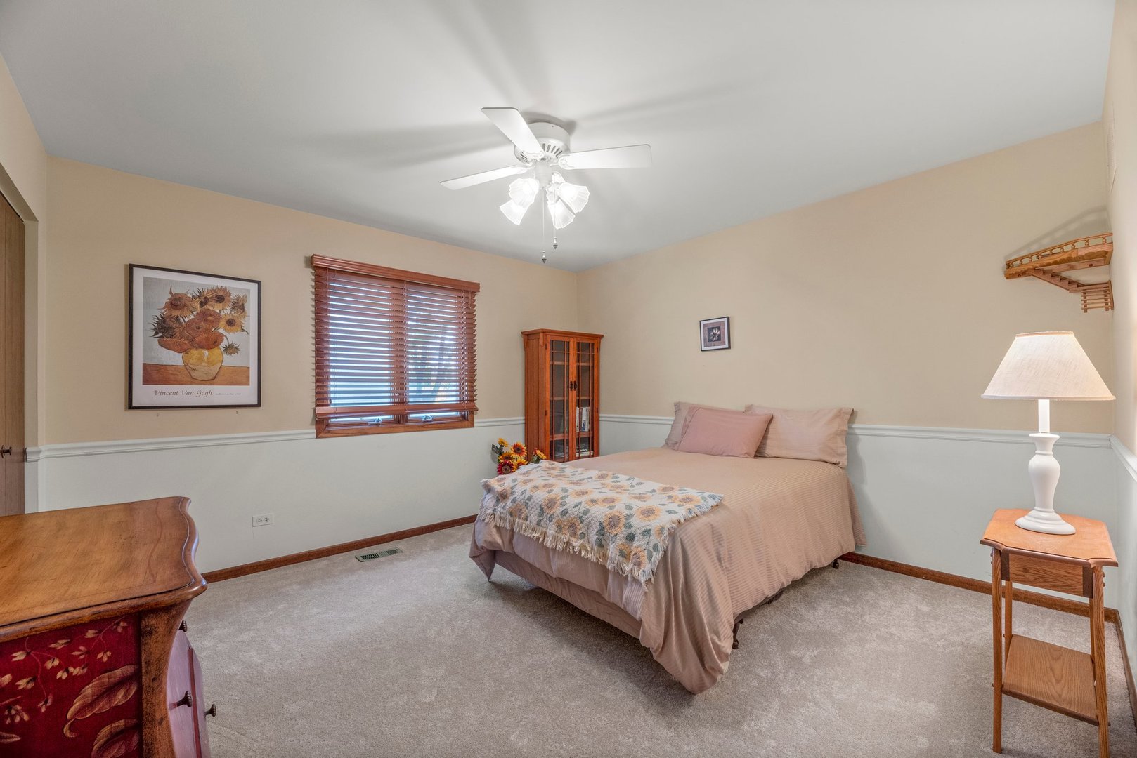 1133 Old Fence Road Addison, IL 60101 - Photo 18 of 29 a bedroom with a bed and a chandelier