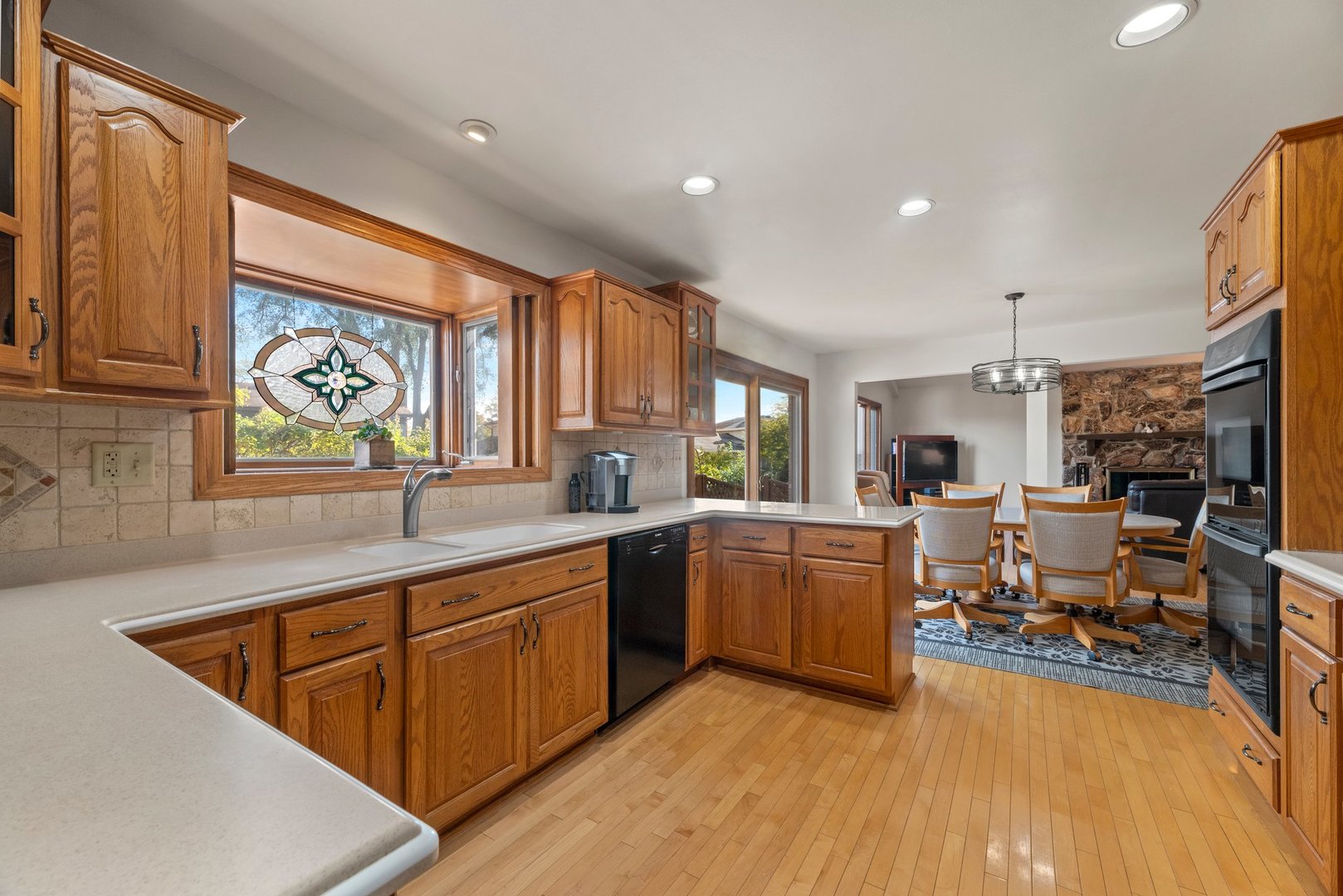 1133 Old Fence Road Addison, IL 60101 - Photo 7 of 29 a kitchen with lots of counter top space and dining table