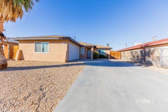 929 South Ranger Street Ridgecrest, CA 93555 - Photo 1 of 25 a view of house with wooden fence