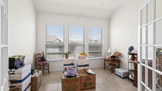 a room with furniture and a window