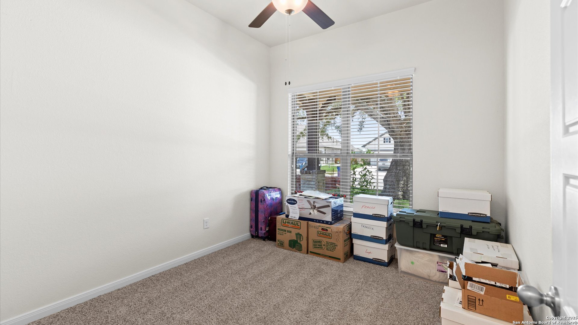 425 Foxbrook Way Cibolo, TX 78108 - Photo 17 of 29 a room with furniture and a window