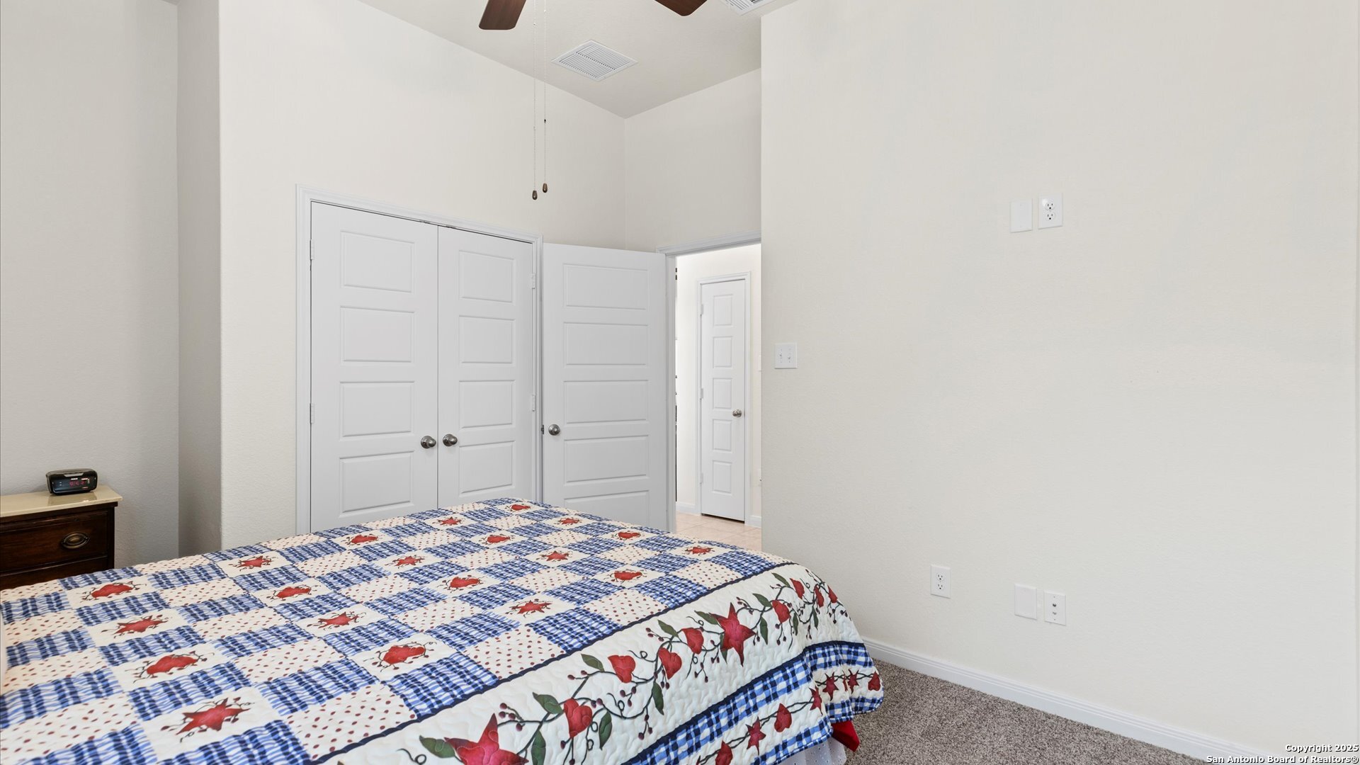 425 Foxbrook Way Cibolo, TX 78108 - Photo 22 of 29 a bedroom with a bed and a cabinets