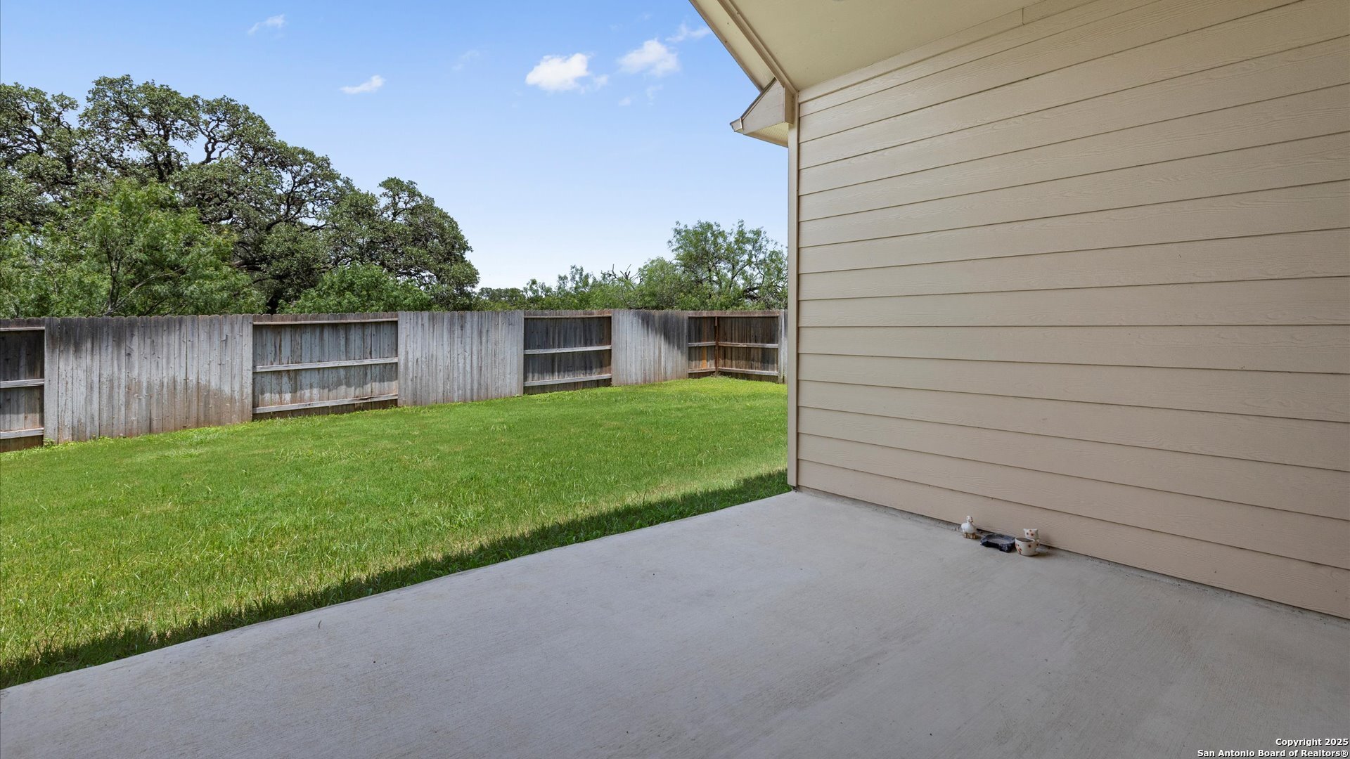 425 Foxbrook Way Cibolo, TX 78108 - Photo 27 of 29 a view of a backyard with a small cabin