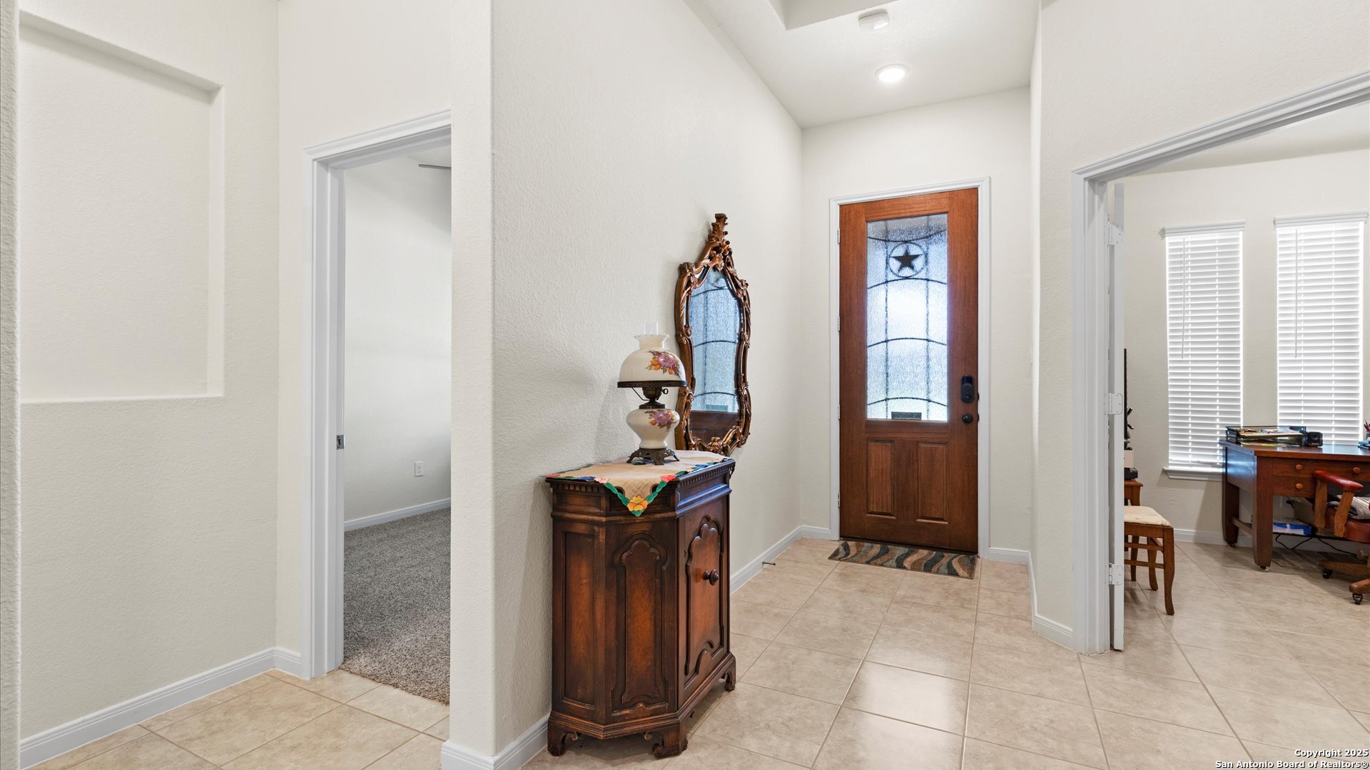 425 Foxbrook Way Cibolo, TX 78108 - Photo 4 of 29 a view of a hallway with living room and furniture