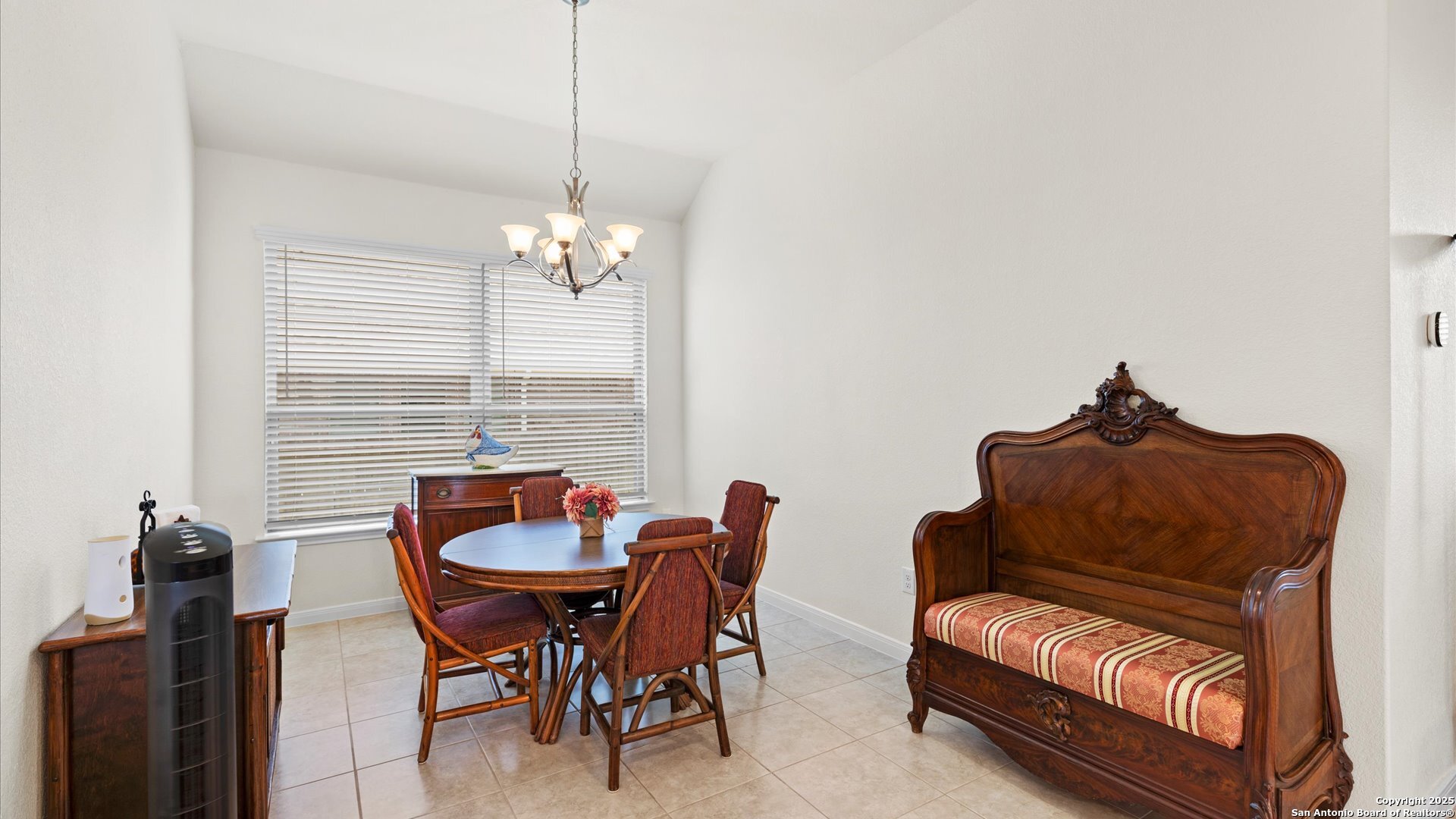 425 Foxbrook Way Cibolo, TX 78108 - Photo 7 of 29 a dining room with furniture and window