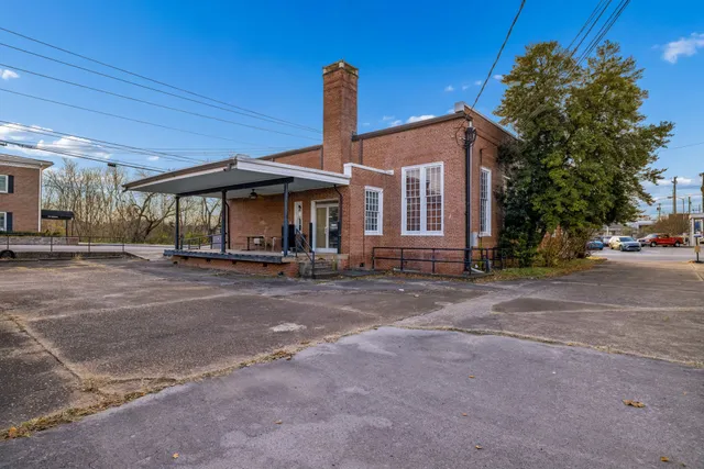 a front view of a house with street