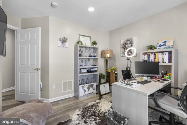 a workspace with furniture and window