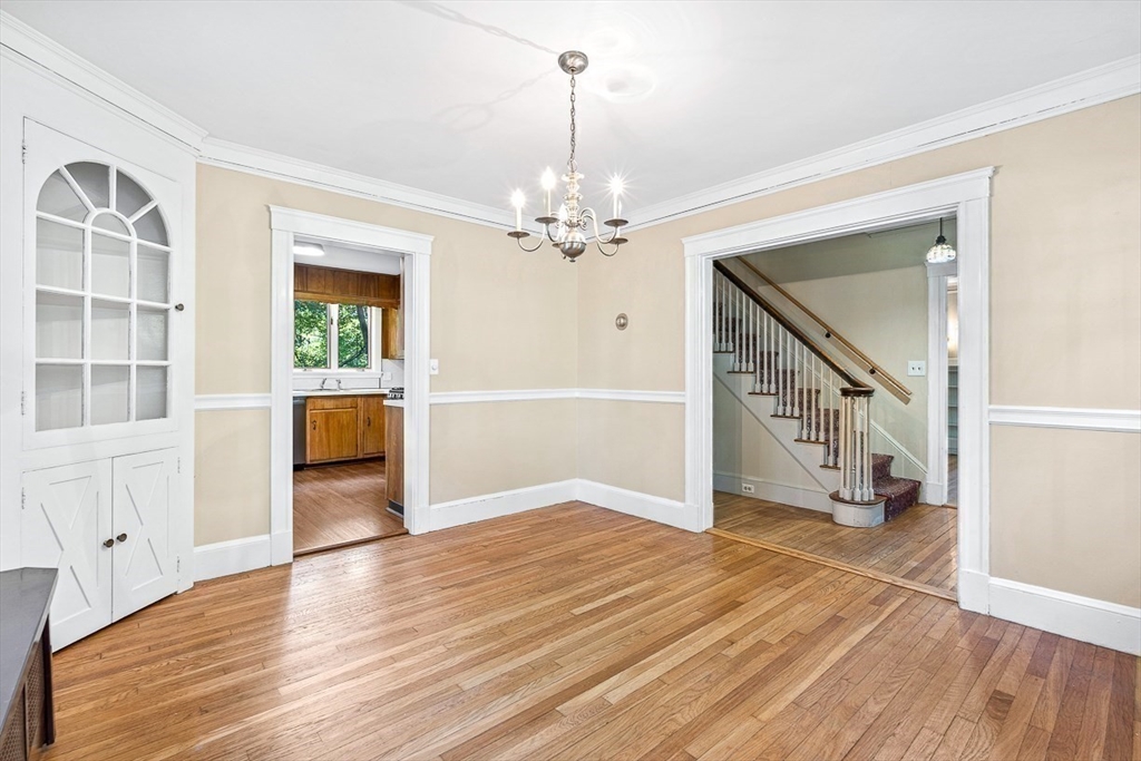 17 Colburn Road Wellesley, MA 02481 - Photo 13 of 30 wooden floor in an empty room with a window