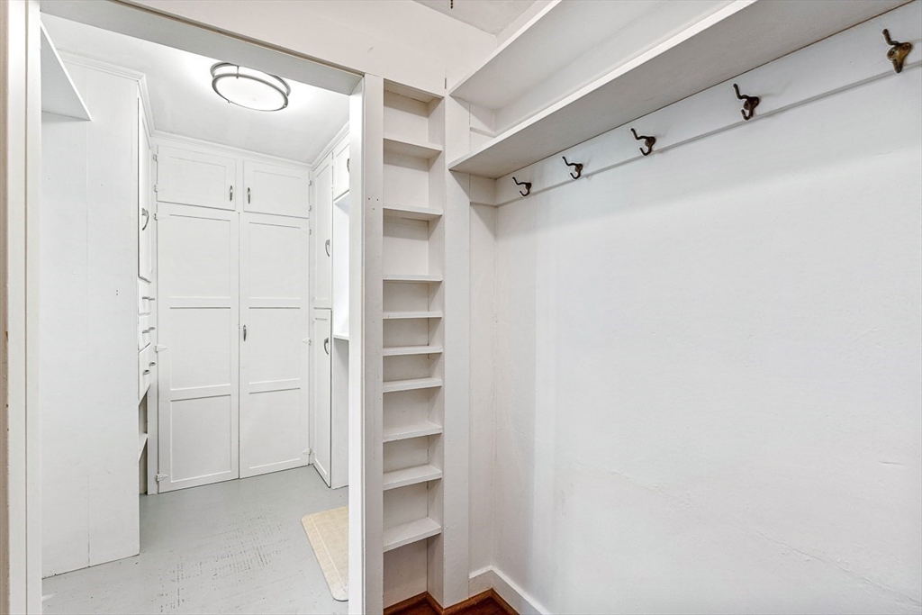 17 Colburn Road Wellesley, MA 02481 - Photo 17 of 30 a view of walk in closet with empty racks