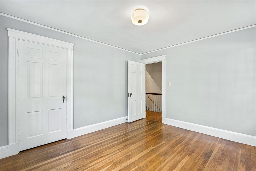 17 Colburn Road Wellesley, MA 02481 - Photo 19 of 30 an empty room with wooden floor and closet
