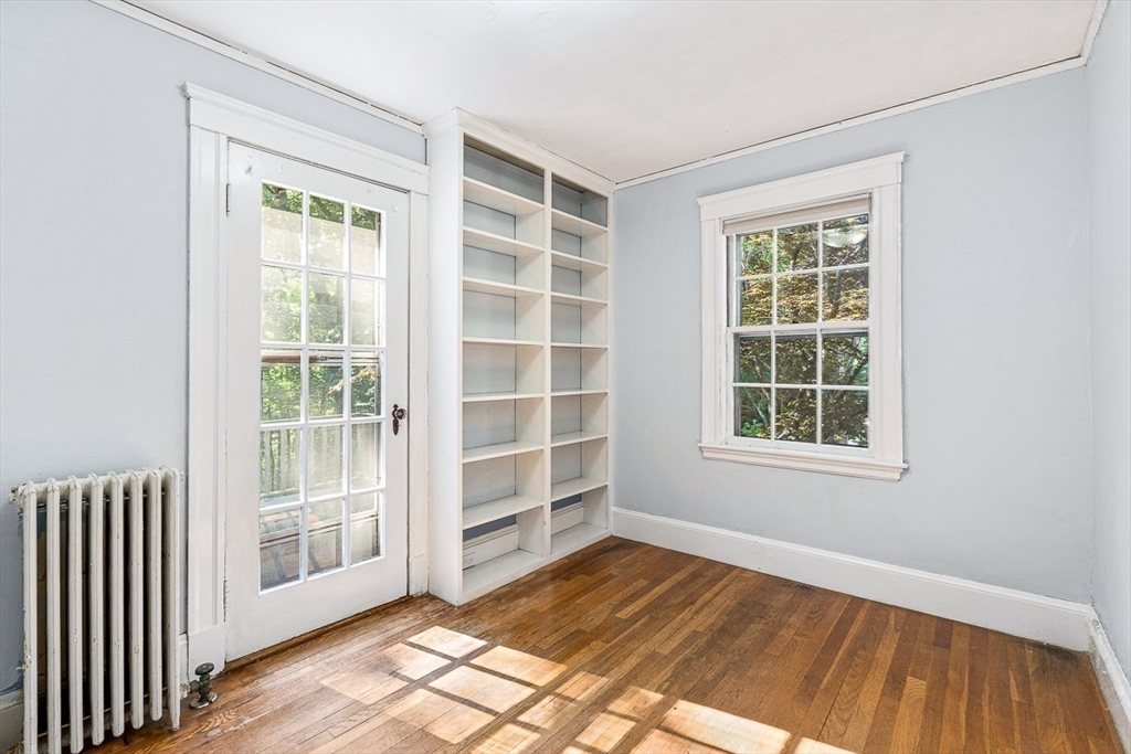 17 Colburn Road Wellesley, MA 02481 - Photo 26 of 30 an empty room with wooden floor and windows