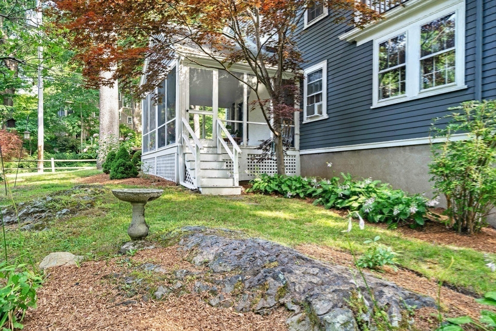17 Colburn Road Wellesley, MA 02481 - Photo 27 of 30 a view of a house with a yard and plants
