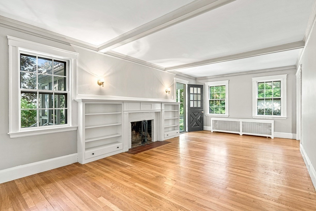 17 Colburn Road Wellesley, MA 02481 - Photo 8 of 30 a view of an empty room with window and fire place