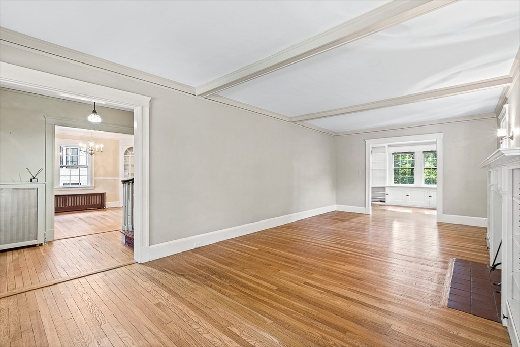 17 Colburn Road Wellesley, MA 02481 - Photo 9 of 30 wooden floor in an empty room with a window