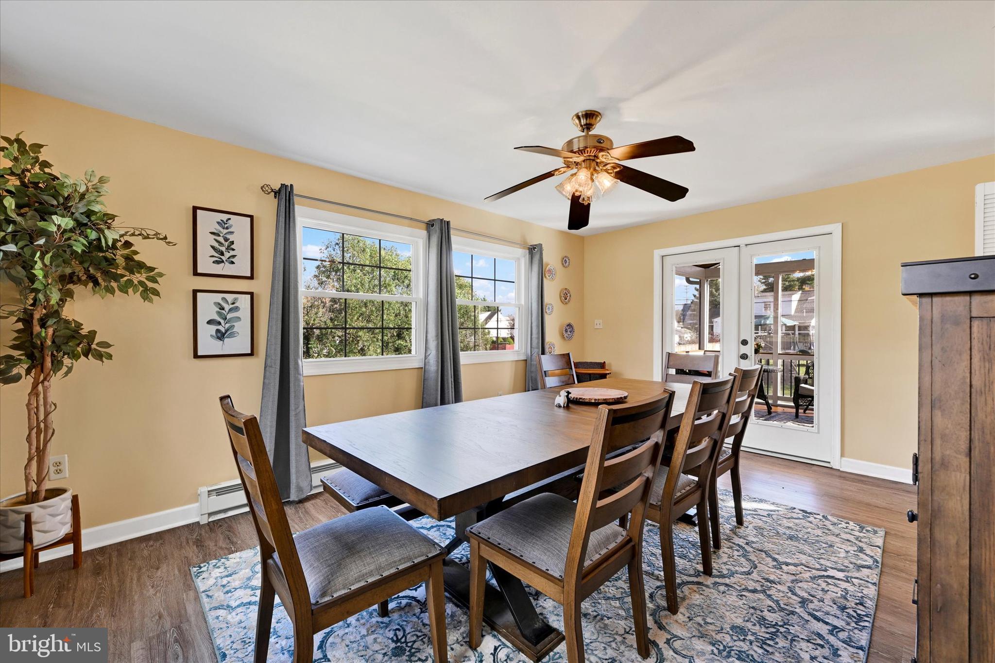 9 Othoridge Road Lutherville-Timonium, MD 21093 - Photo 13 of 37 a view of a dining room with furniture window and wooden floor