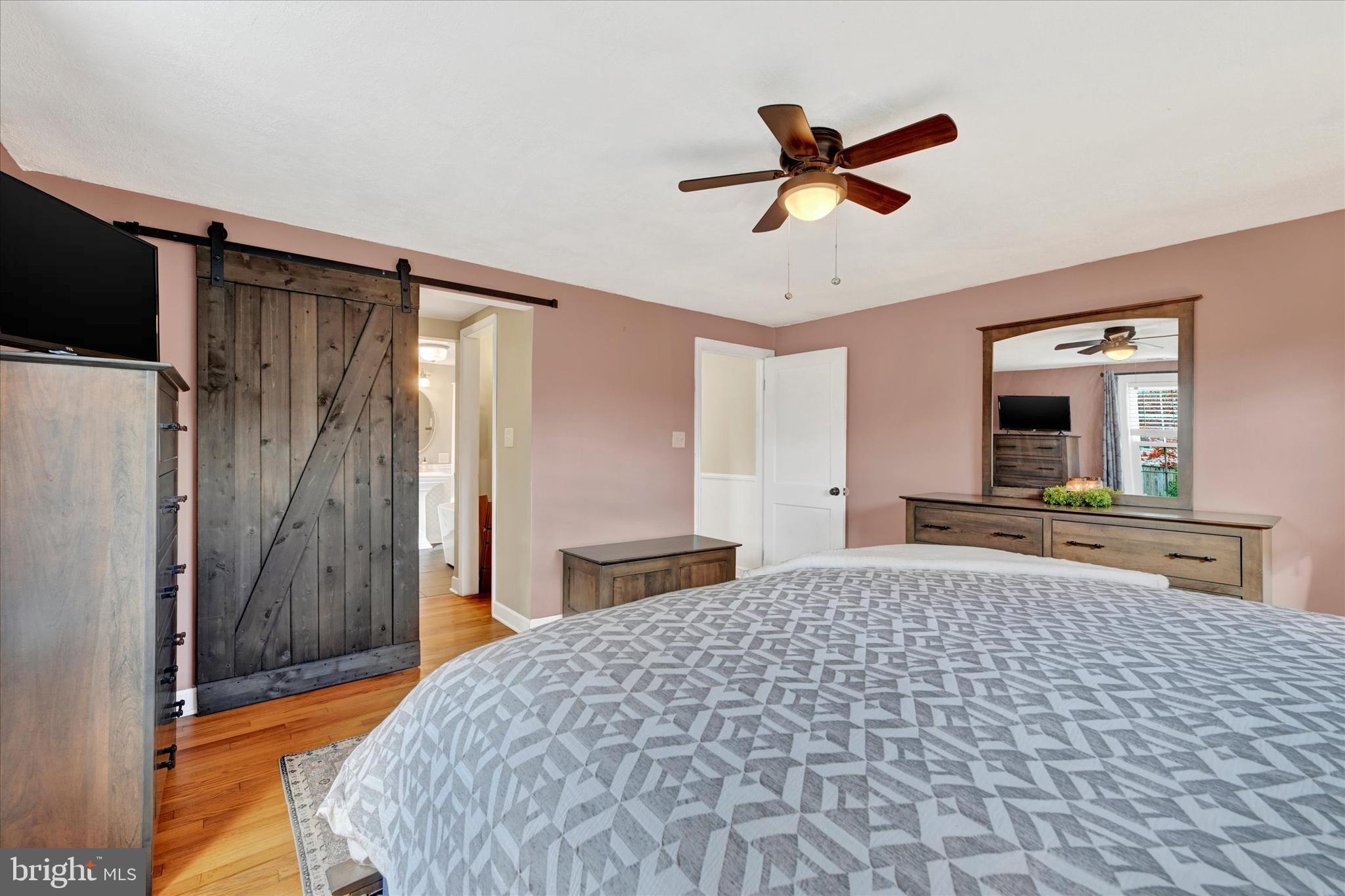 9 Othoridge Road Lutherville-Timonium, MD 21093 - Photo 20 of 37 a bedroom with a bed and a flat screen tv