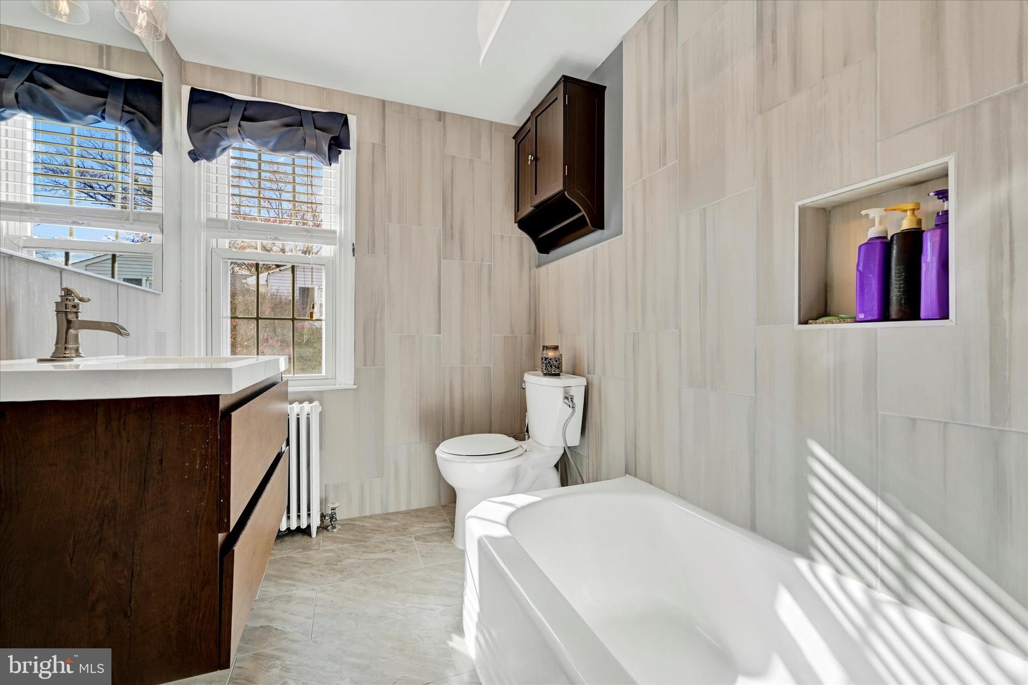 9 Othoridge Road Lutherville-Timonium, MD 21093 - Photo 26 of 37 a bathroom with a sink toilet and shower